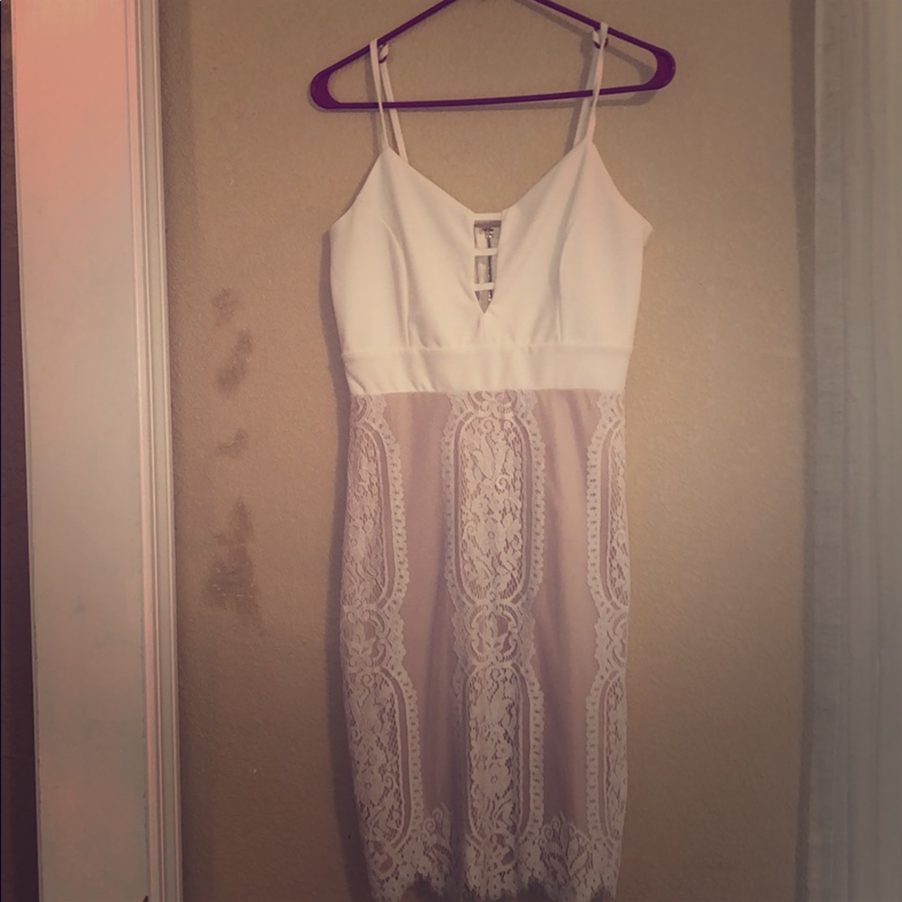 White and tan lace cocktail dress.